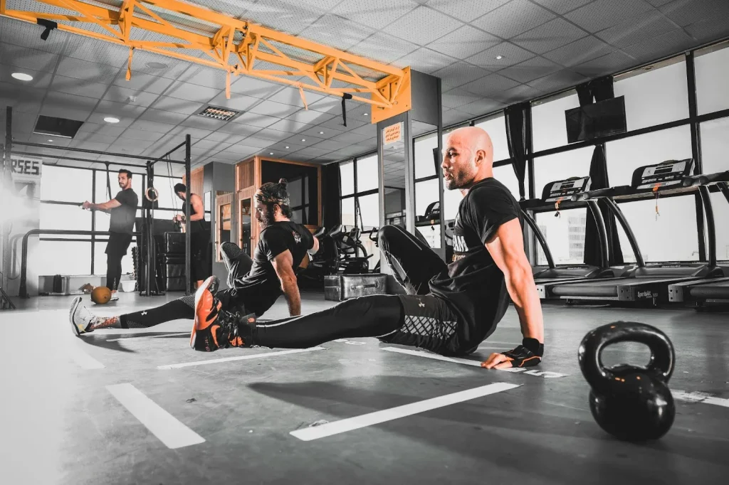 A group of men working out in a fitness gym