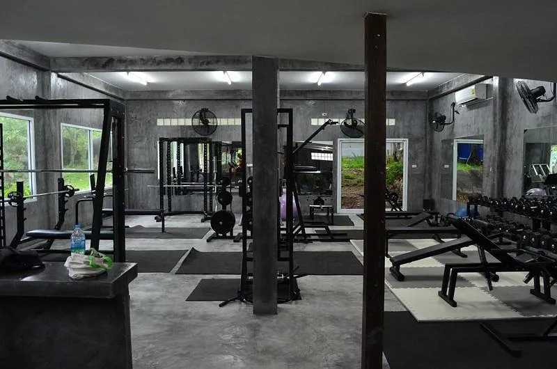 The industrial and minimalist interior of Monsoon Gym in Koh Tao
