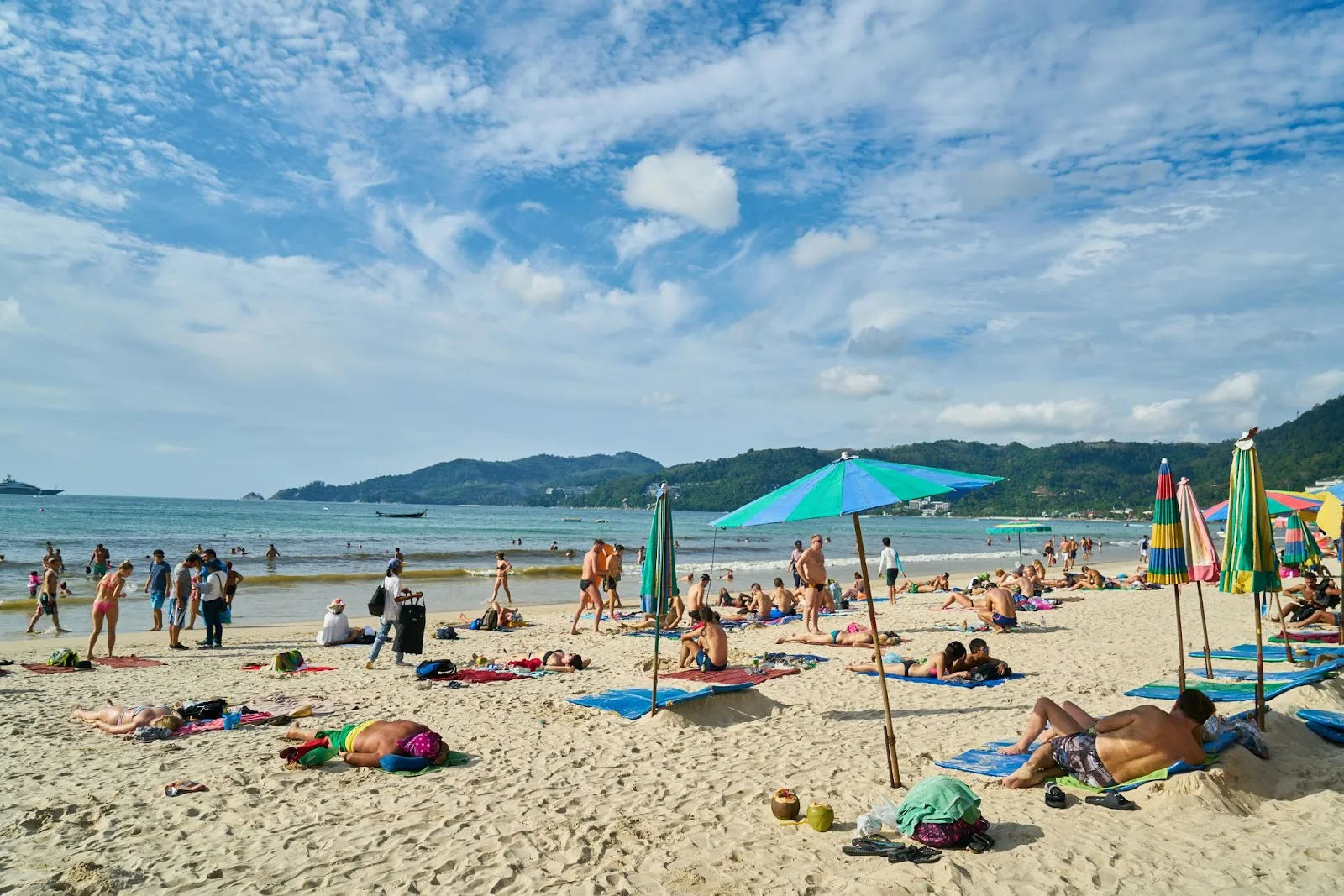 The crowded beach with tourists at Koh Lanta