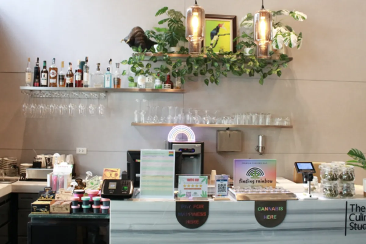 The view of the Finding Rainbow Dispensary cafe counter filled with various cannabis products