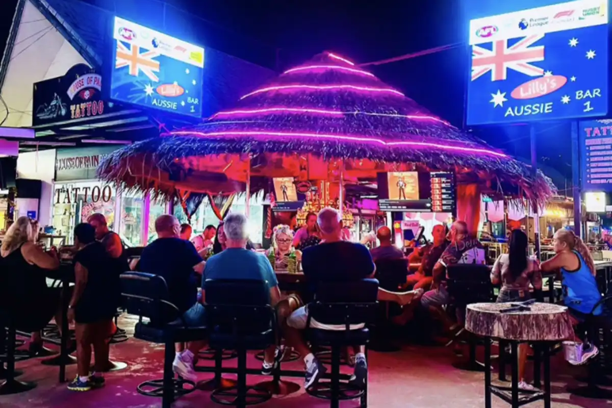A neon-lighted hut houses Lilly’s Aussie Bar in Patong.