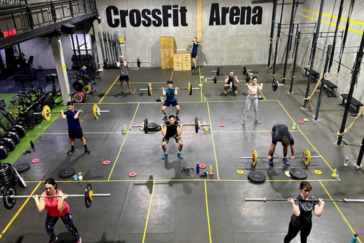 A group of people doing a weightlifting class at Crossfit Arena in Bangkok