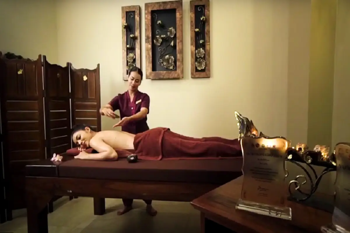A woman having an oil massage by a female therapist at Lila Thai Massage in Chiang Mai