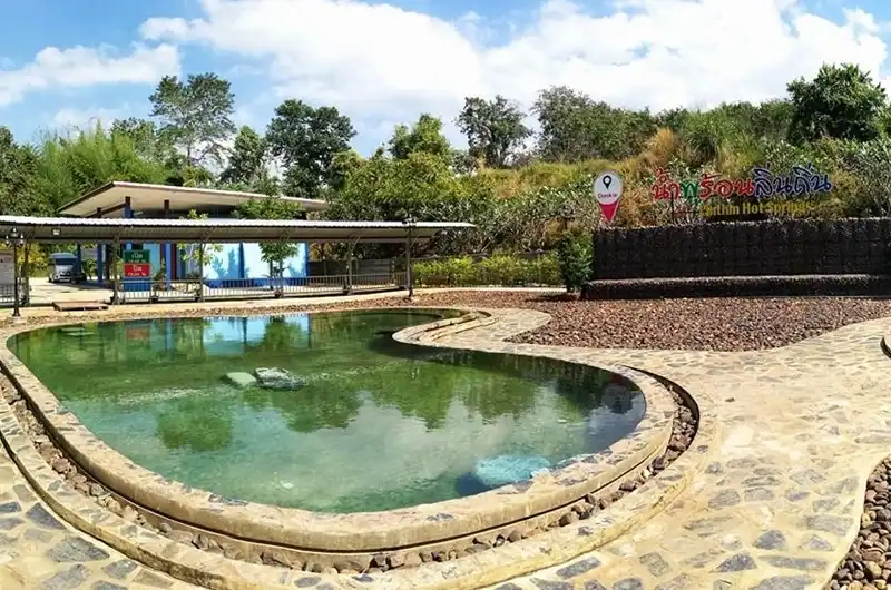 The overview of the natural hot spring pool at Lin Thin Hot Spring in Kanchanaburi