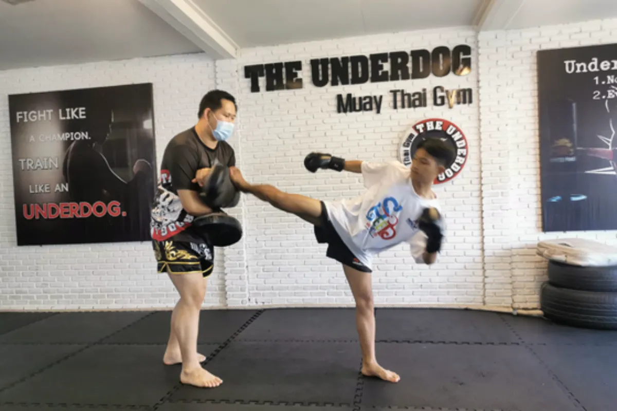 A young man is training in Muay Thai at The Underdog Muay Thai Gym in Chiang Mai